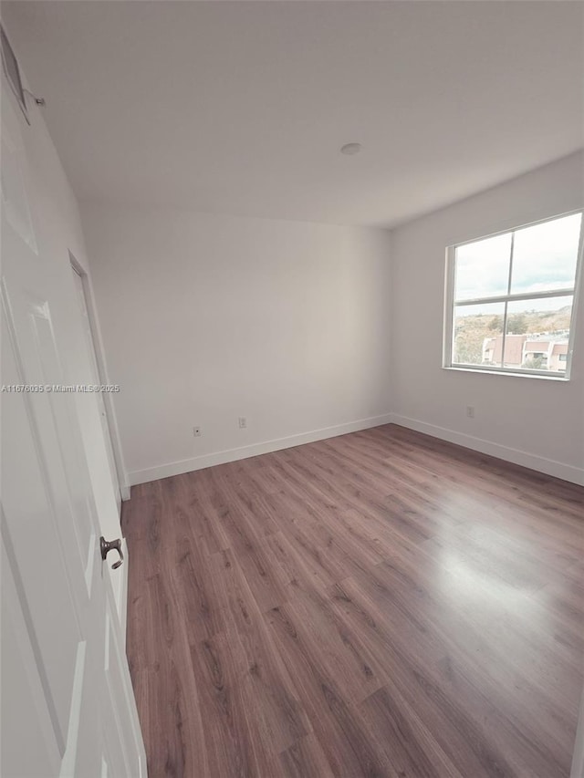 9021 SW 94th St Unit 603, Miami, FL 33176 - unfurnished room featuring wood finished floors and baseboards
