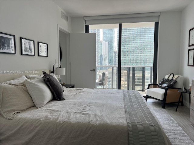 bedroom featuring hardwood / wood-style floors