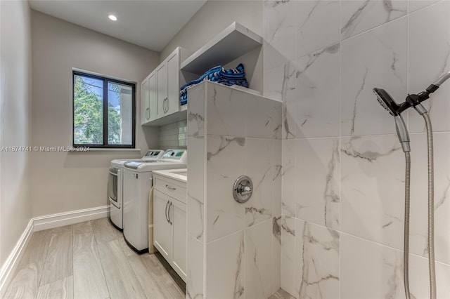 laundry room featuring washer and clothes dryer