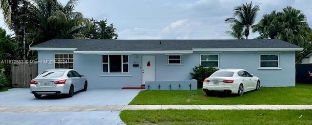 ranch-style home with a front yard