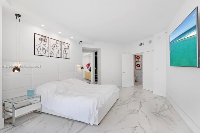 bedroom with tile walls