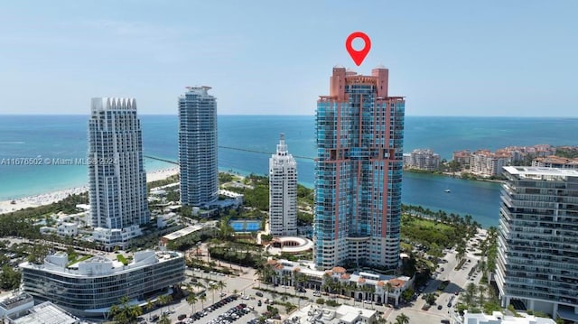 city view featuring a water view and a beach view