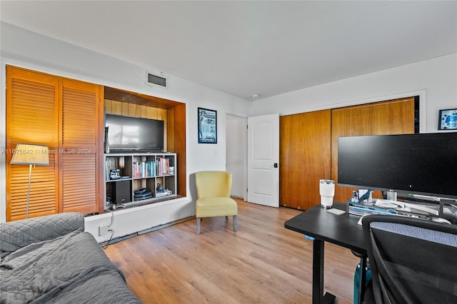 office area with light hardwood / wood-style flooring