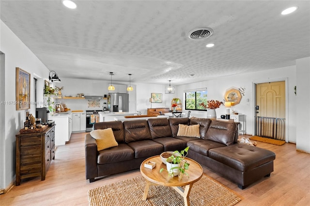 living room with light wood-type flooring