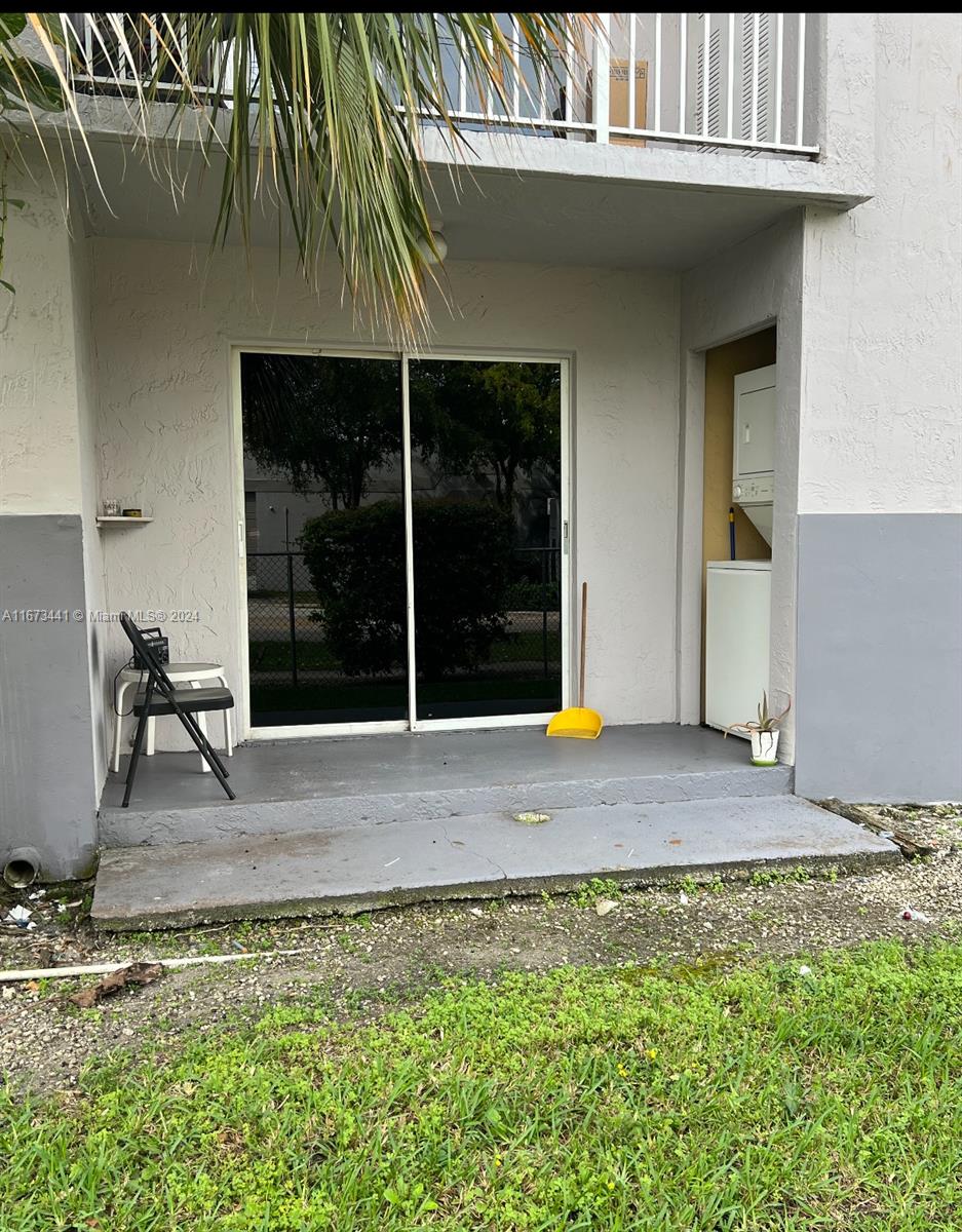 doorway to property with a balcony