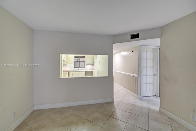 view of tiled spare room