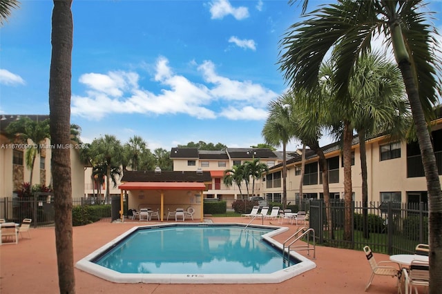 view of pool featuring a patio