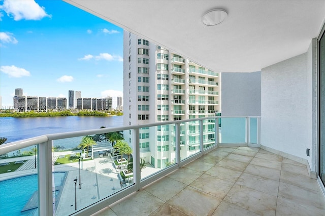 balcony featuring a water view