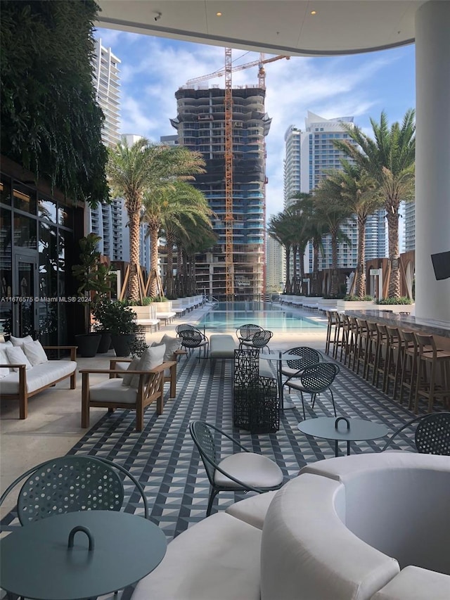 view of swimming pool featuring a patio area