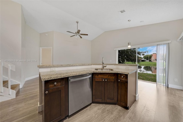 kitchen with stainless steel dishwasher, vaulted ceiling, light hardwood / wood-style flooring, sink, and a water view