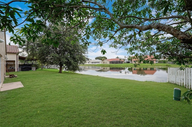 view of yard with a water view