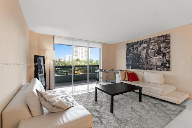 tiled living room with expansive windows