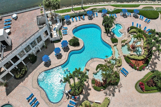 view of swimming pool featuring a patio area