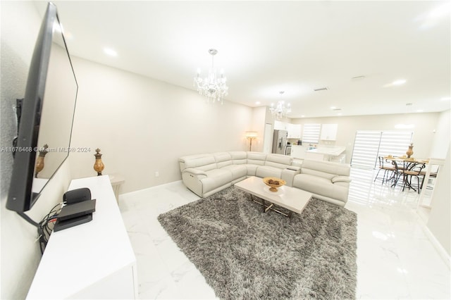 living room featuring a chandelier