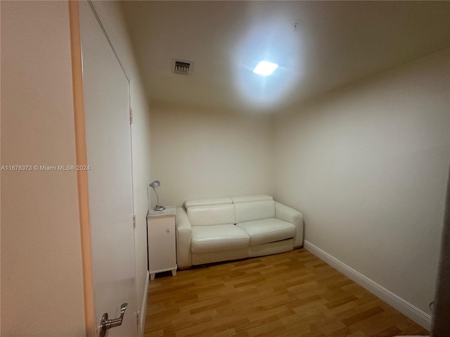 unfurnished room with light wood-type flooring