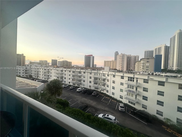 view of balcony at dusk