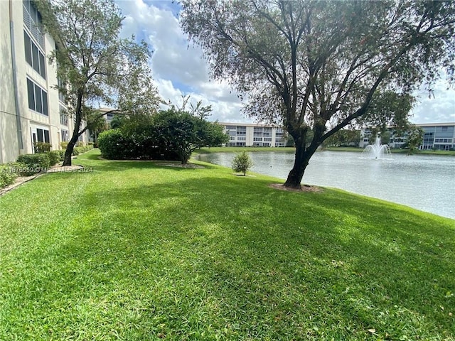 view of yard with a water view