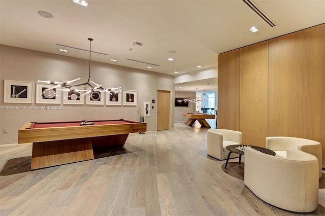 rec room featuring pool table and light hardwood / wood-style flooring