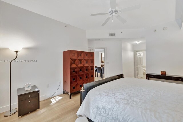 bedroom featuring light hardwood / wood-style flooring and ceiling fan