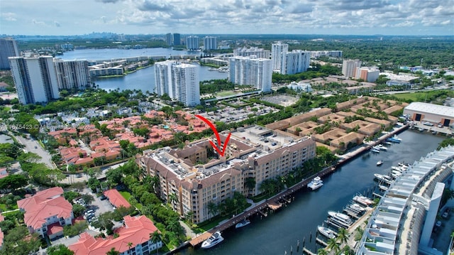 bird's eye view with a water view and a view of city