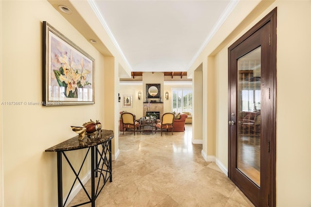 hallway featuring crown molding