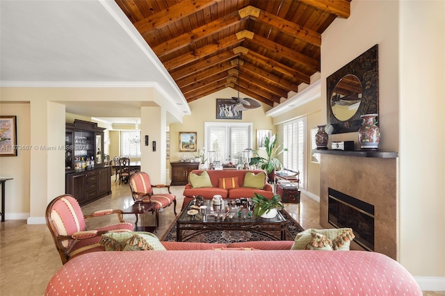 tiled living room featuring a wealth of natural light, a premium fireplace, and wooden ceiling