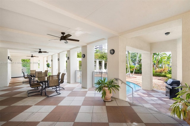 view of patio / terrace featuring a grill and ceiling fan