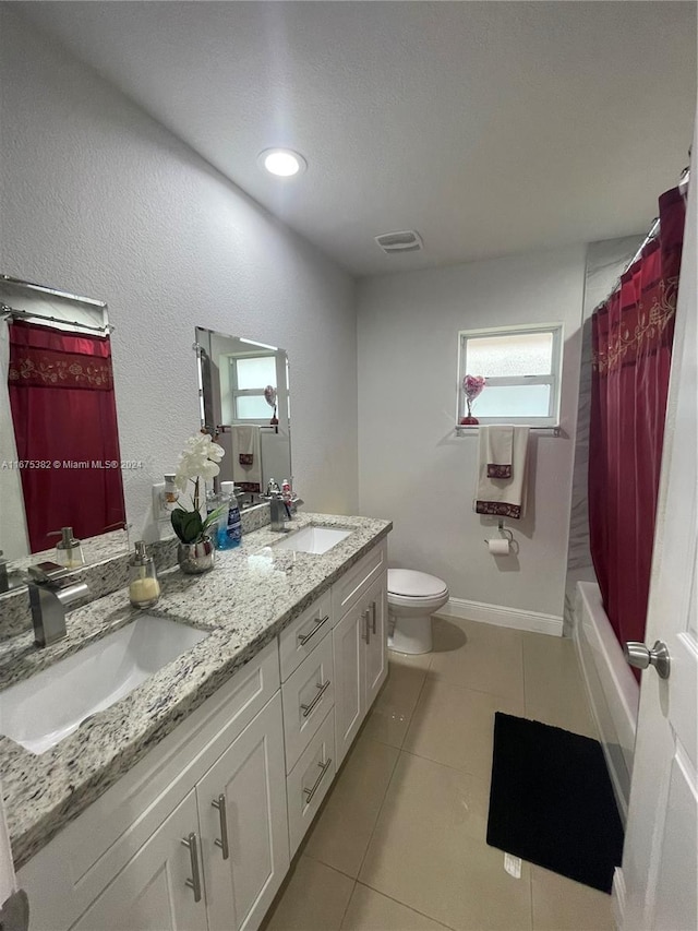 1369 Rainbow Ave, Palm Beach, FL 33406 - bathroom featuring double vanity, tile patterned flooring, and shower / bathtub combination with curtain