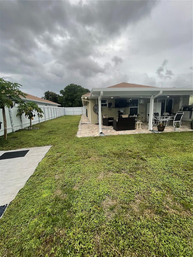 1369 Rainbow Ave, Palm Beach, FL 33406 - fenced backyard featuring outdoor lounge area and a patio