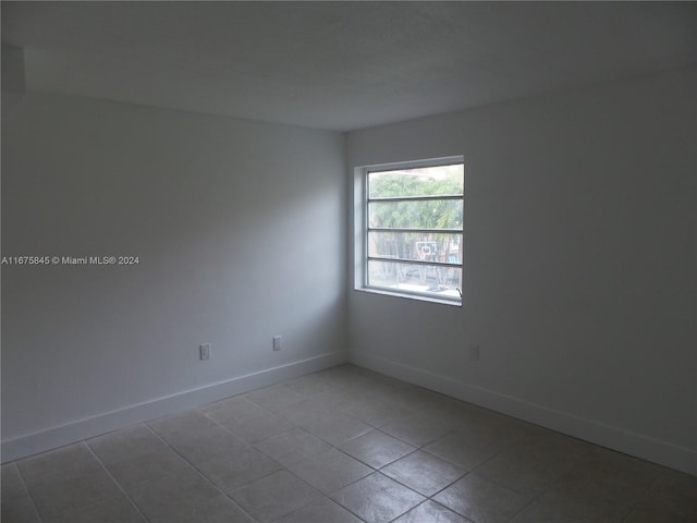 view of tiled spare room