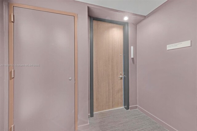 88 SW 7th St Unit 3806, Miami, FL 33130 - hall with baseboards, carpet floors, and recessed lighting