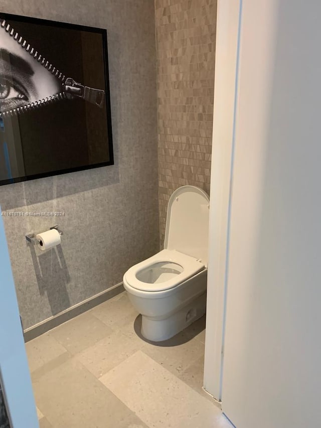 bathroom featuring toilet