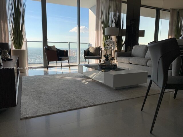 88 SW 7th St Unit 3806, Miami, FL 33130 - living room with a wall of windows