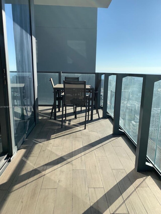 88 SW 7th St Unit 3806, Miami, FL 33130 - balcony with outdoor dining area