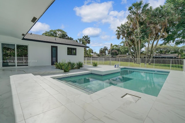 view of pool featuring a patio