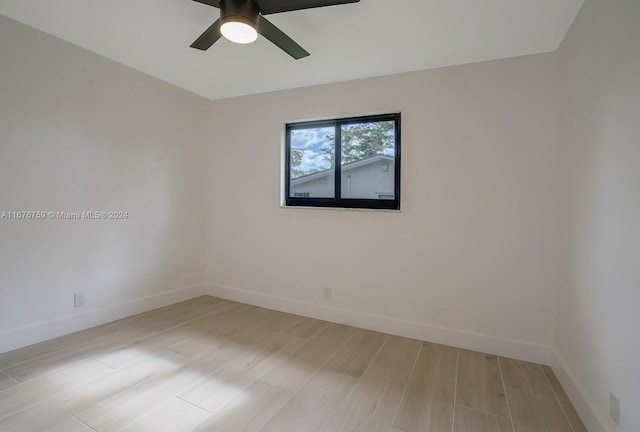 unfurnished room with light hardwood / wood-style flooring and ceiling fan