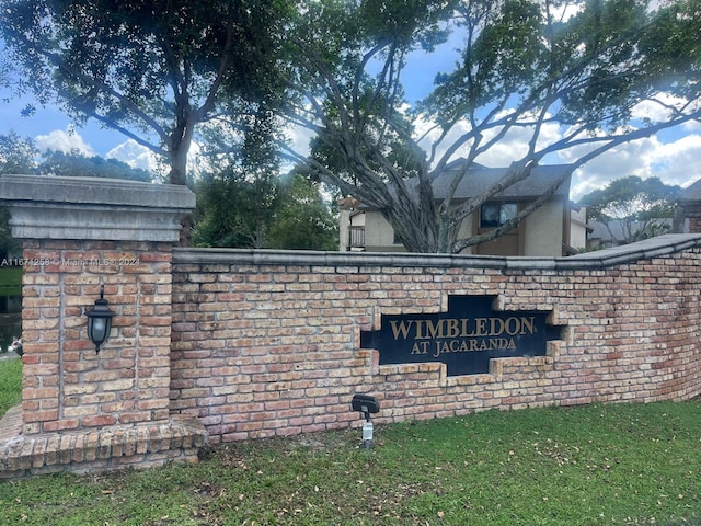 view of community sign