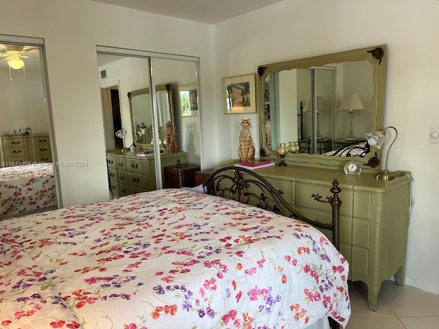 tiled bedroom featuring a closet and ceiling fan