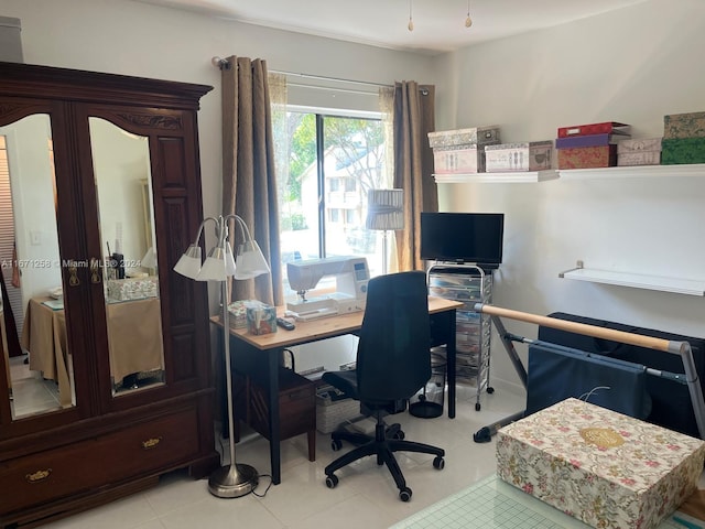 office space with light tile patterned floors