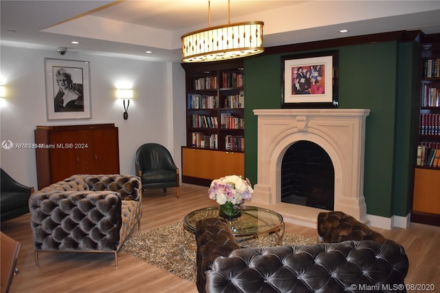 sitting room featuring hardwood / wood-style floors