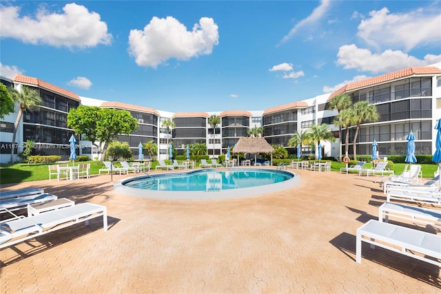 view of swimming pool featuring a patio area