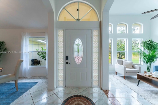 entryway with light tile patterned floors