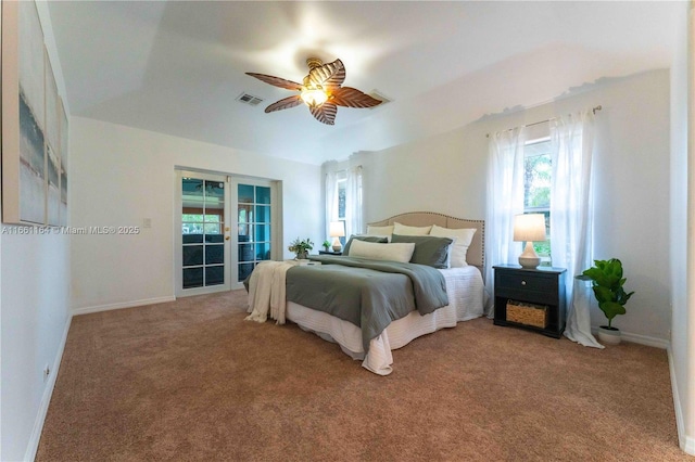 bedroom featuring french doors, ceiling fan, and carpet floors