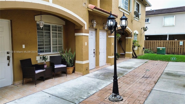 property entrance with a patio