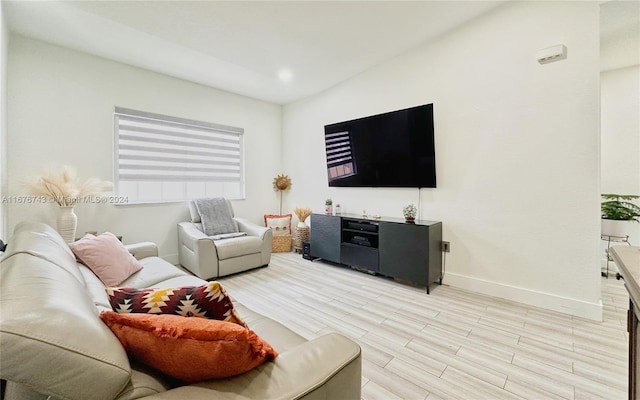 living room with light hardwood / wood-style flooring