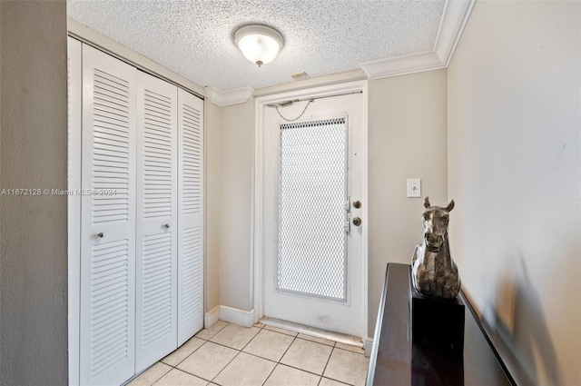 doorway featuring crown molding, a textured ceiling, and light tile patterned flooring