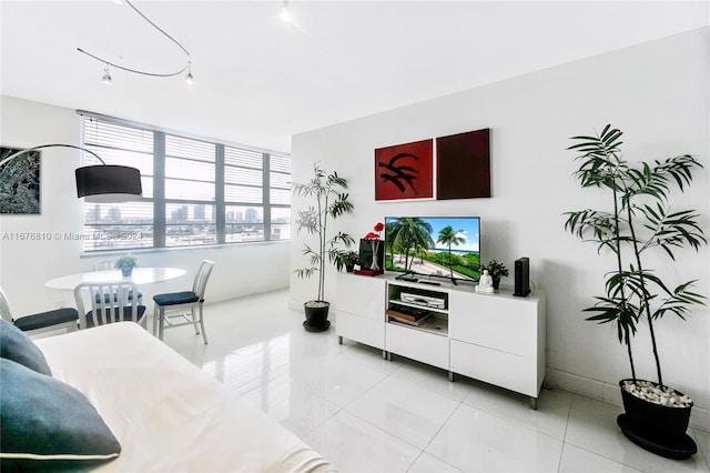 living room with light tile patterned flooring