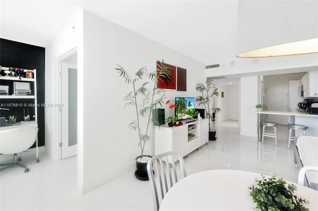 100 Lincoln Rd Unit 1201, Miami Beach, FL 33139 - dining area with light tile patterned floors