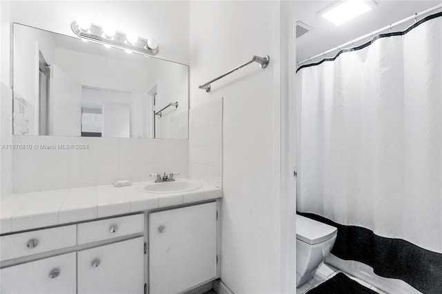 100 Lincoln Rd Unit 1201, Miami Beach, FL 33139 - bathroom with vanity, backsplash, and a shower with curtain