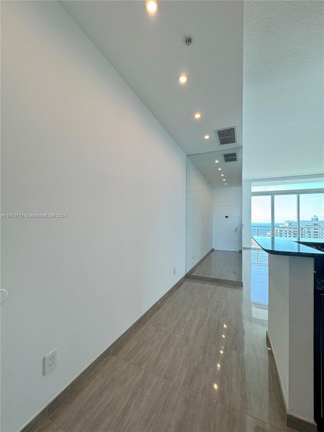 325 S Biscayne Blvd Unit 19, Miami, FL 33131 - unfurnished room featuring recessed lighting, baseboards, and fire sprinkler in ceiling